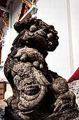 Chiang Mai - The Wat Phra Singh temple. Chinese style statue of lion. 